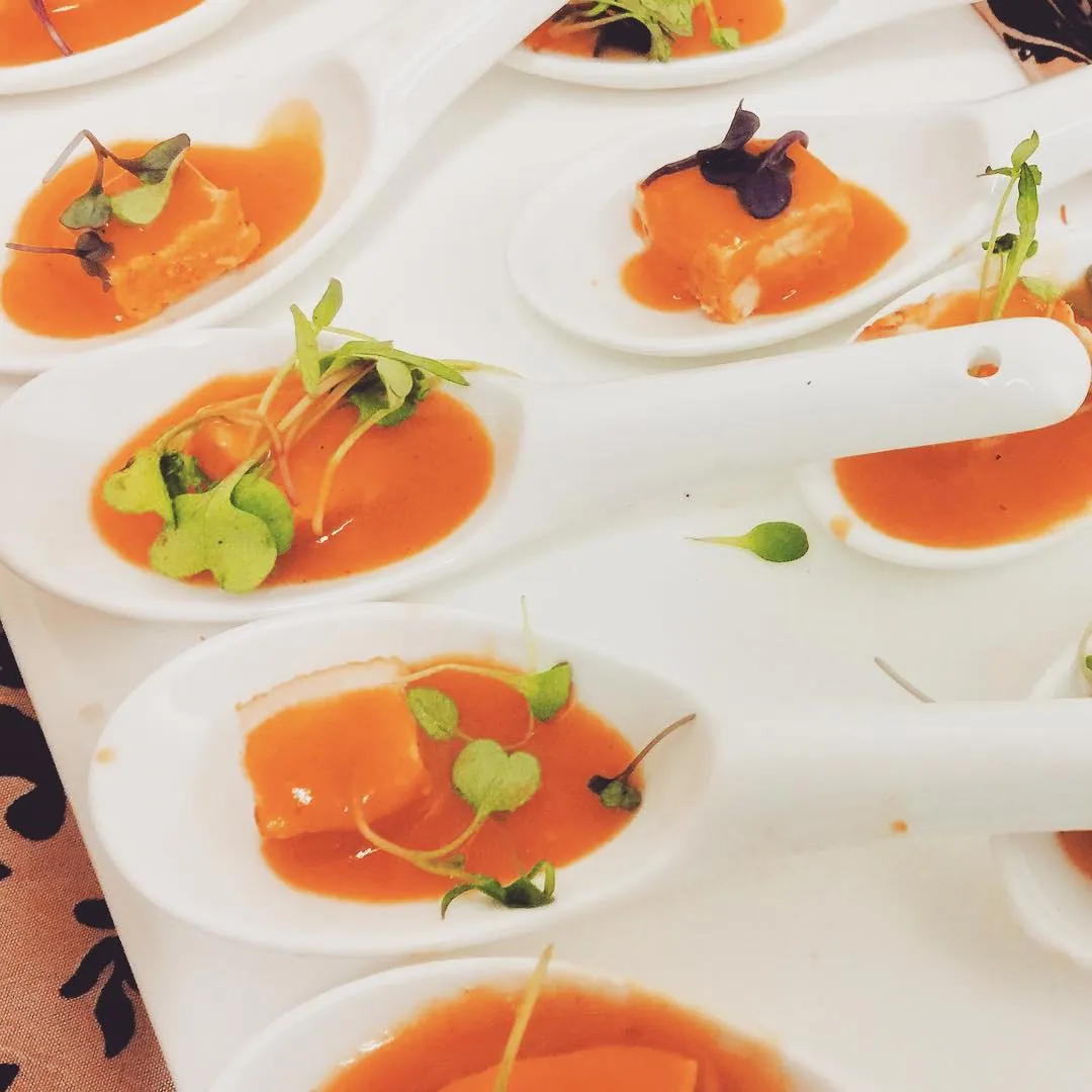 Passed hors d'oeuvres on tasting spoons at a holiday party catered by KMR Gourmet